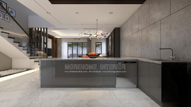 Trang trí nội thất phòng bếp biệt thự hiện đại mới lạ với ý tưởng sử dụng bếp đảo tách rời nhưng vẫn đảm công năng thiết kế khi trang bị máy rửa bát, bồn rửa, tủ nhiều ngăn và bề mặt lớn đá nhân tạo có thể giúp bạn trưng bày lượng lớn các món ăn của mình. Thiết kế nội thất biệt thự