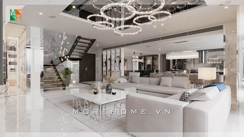 Bàn trà chân sắt với mặt đá vân mây trắng mang lại một phong cách độc đáo giúp tôn lên nét hiện đại trong thiết kế.