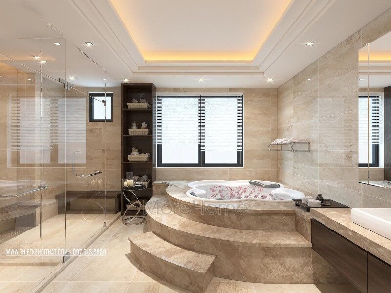 Bồn tắm sâu có thiết kế dạng bậc ốp đá tự nhiên cao cấp là điểm nhấn giúp phòng tắm trở nên sang trọng và đẳng cấp.